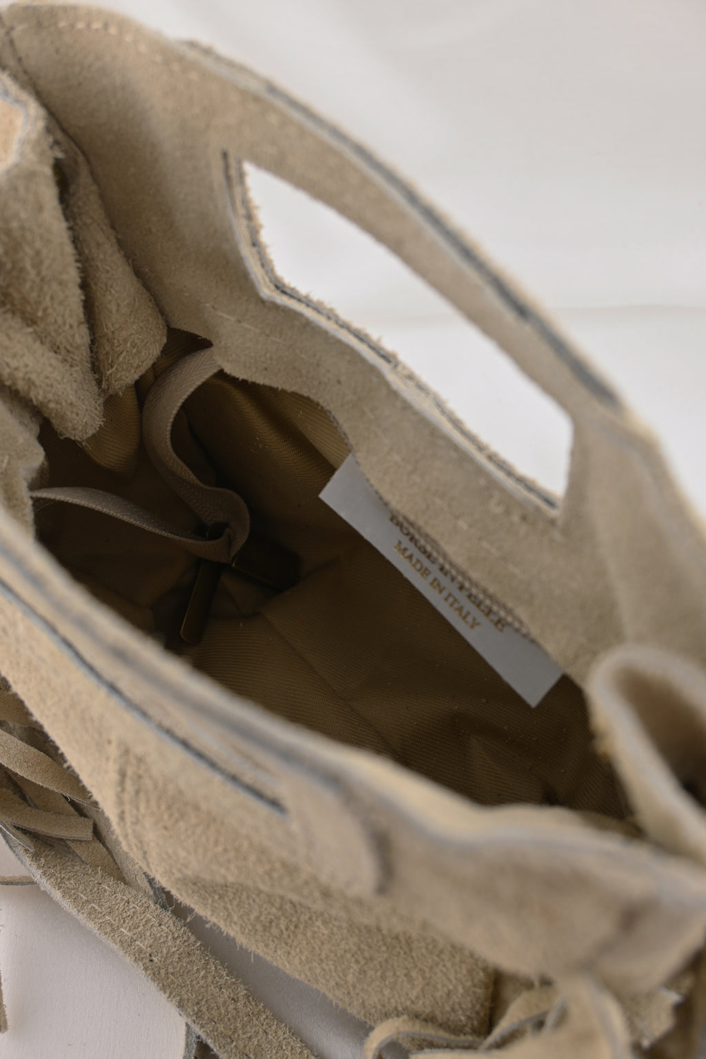 Borsa piccola con frange e manico rettangolare