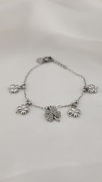 Bracciale con quadrifogli pendenti