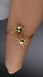 Bicep cuff with two suns