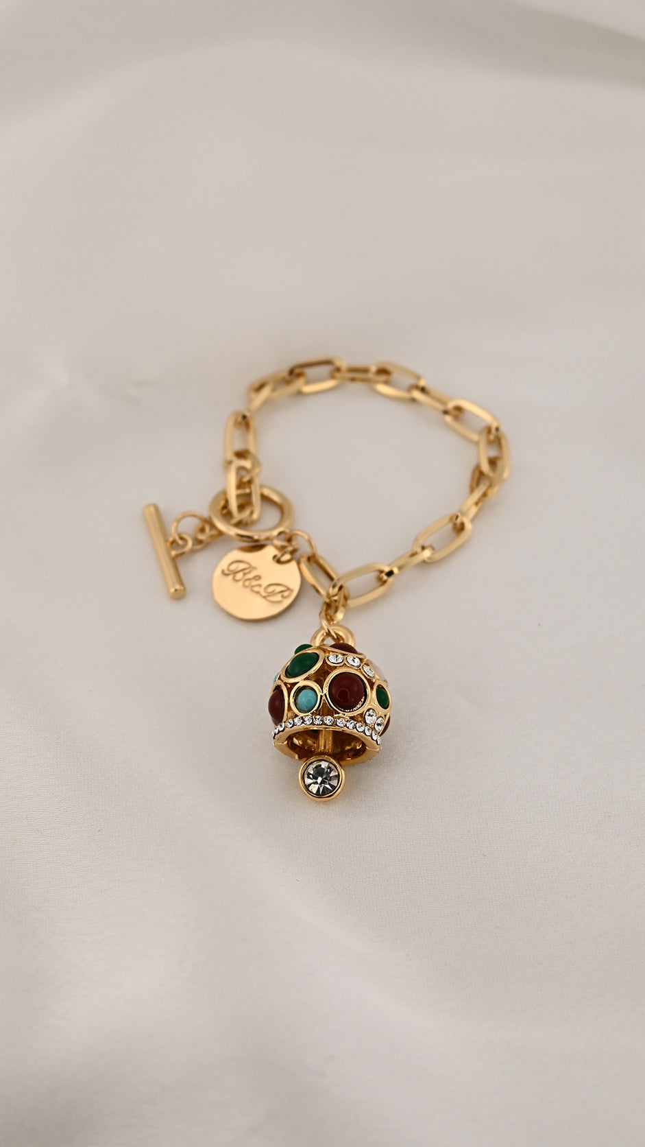 Bracciale a catena dorata con charm cupola
