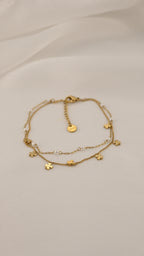 Bracciale doppia catena con simboli e perle
