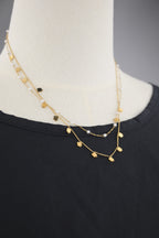 Collana doppia catena con simboli e perle