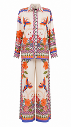 Pantaloni palazzo con stampe tropicali e dettagli animalier