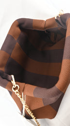 Clutch bag a righe