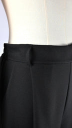 Pantalone ampio con pieghe