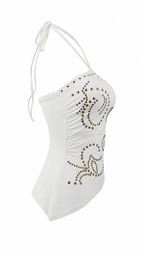 Top asimmetrico con borchie